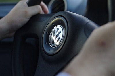 hands on a Volkswagen steering wheel