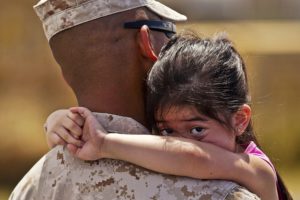 soldier with his daughter