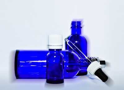 blue essential oil bottles