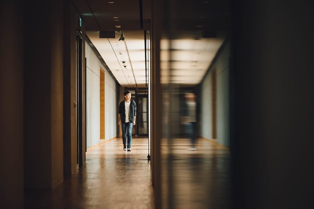 boy in a school hallway