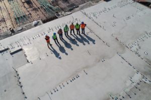 men standing at a construction site
