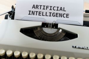 typewriter with "artificial intelligence" typed
